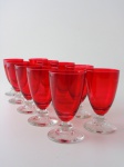 Dez taças de cristal  na cor rubi. Quatro taças com pequena falha na cor, altura  12 cm.