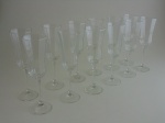 Doze taças em cristal para champanhe oitavadas.  Altura 22 cm.