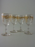 Quatro  taças de cristal Saint  Louis  com decoração a ouro. Altura 14,5 cm.
