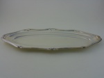 Travessa para  peixe em metal prateado Fracalanza.  Comprimento 62 cm, largura 23 cm.
