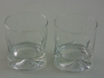 Par de copos. Altura  7 cm.