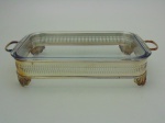 Travessa com suporte em metal prateado. Comprimento 40 cm , largura 22 cm , altura  8 cm.