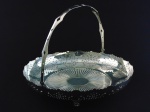 Cesta com em metal com banho de prata. Altura 8 cm, diâmetro 36 cm.