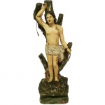 Escultura em madeira representando São Sebastião. Brasil, Séc XIX. 43 cm de altura.