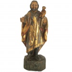 Escultura em madeira representando São José com menino Jesus. Brasil, Séc XIX. 23 cm de altura.
