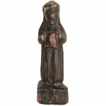 Imagem em madeira representando Santo. Brasil, Séc. XIX. 6,5 cm de altura.