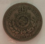 Moeda 100 Reis, Brasil Imperial, cunhada em 1884.