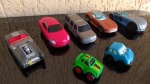7(sete) Diecast miniaturas de carros, escalas diferentes, todos usados conforme imagens.