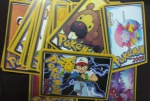 60 CARDS GAME POKEMON = 7 X 5 CENTÍMETROS , MARCAS DO TEMPO E USO.