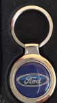 Chaveiro temático FORD - metal medindo 7 centímetros - sem uso na caixa original.