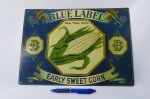 Placa de Lata em relêvo - Motivo Milho (Early Sweet Corn). Mede aproximadamente 38,5 x 28,5 centímetros.