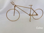 Enfeite Replica Bicicleta - Em Ferro Pintada dourado. MEDIDA : 36CM DE COMPRIMENTO ,14 CM DE ALTURA