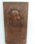 Quadro  talha em madeira com 2 faces representando Nossa Senhora e Jesus. Marcado L. Holanda na base. Medida 50cm x 27.. Pesada.