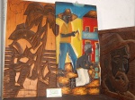 Lote com 03 quadros entalhados em madeira.