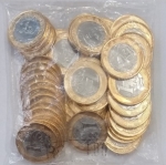 5 moedas de 1 real de 2014 retiradas do sache