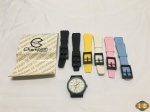 Relógio de pulso Champion com 6 pulseiras personalizadas, necessita troca de bateria.