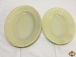 Lote de 2 travessas ovais rasa em vidro Colorex creme. Medindo o maior 31cm x 24cm.