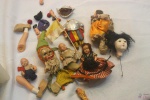 Lote com diversas peças de bonecas com mais de 80 anos.