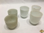 Lote de 5 bobeches em vidro opalinado. Medindo 8cm de altura x 1,5cm de diâmetro inferior x 7cm de diâmetro superior.