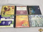Lote de 6 Cd's originais com titulos nacionais e internacionais composto por Backstreet Boys, Sandy e Junior, Lulu Santos, etc.