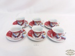 Jogo de 6 xicaras de cafe decoradas papai Noel . em porcelana.meddia 6 diametrox 5 altura, 1 xicara apresenta pequeno bicado