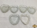 Lote composto de 6 cinzeiros na forma de coração em vidro moldado. Medindo 8,5cm de diâmetro.