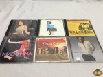 Lote com 6 cds originais, composto de Madonna, The Lion King, etc.