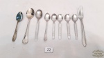 Lote 8  colheres e 1 garfo  aço inox variadosMedidas: maior 15cm  menor 10cm.