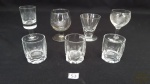 7 copos shot para aperitivo em cristal translucido.Medidas: menor 5cm altura 4cm diâmetro, maior 9cm altura e 5cm diâmetro.