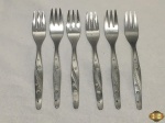 Jogo de 6 garfos de bolo em aço inox Hercules, modelo estrelinha.