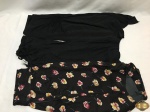 Lote de Roupas feminina. Comporto por 2 saias e 1 blusa. Saia Floral TAM: P, Saia preta TAM: M e blusa TAM: M.