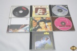 Lote de 7 cd's originais, composto de títulos nacionais como  TIM MAIA, MARISA MONTE, BARÃO VERMELHO, etc.