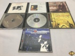 Lote de 7 cd's originais, composto de títulos nacionais e internacionais tais como LEGIÃO URBANA, THE ROLLING STONES,, etc.