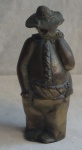 Escultura em bronze polido representando " Sancho Pança " Altura 22 cm. Peça ASSINADA.