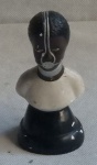 Antiga escultura em estuque da Escrava Anastácia. Alt. 14cm - Escrava Anastácia (Pompéu, 12 de maio de 1740  data e local de morte incertos) é uma personalidade religiosa de devoção popular brasileira, cultuada informalmente pela realização de supostos milagres