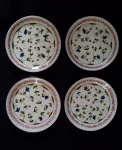 LUIS SALVADOR - Quatro pratos para pão em cerâmica com folhagens multicoloridas. Med.: 18 cm.