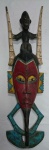 ARTE AFRICANA -  Antiga mascara tribal do séc. XIX (Iorubá) confeccionada em madeira nobre, representando " Cabeça encimada com figura" com rica policromia.  Med.: 77 X 23 cm. Estamos oferecendo o pendant no lote subsequente.