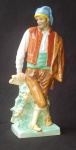 VISTA ALEGRE - Antiga escultura em porcelana portuguesa representando "Gajo" . Avista- se colado n pescoço. Med.: 22 x 11 cm.