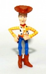 TOY STORY - DISNEY / PIXAR - Figura em vinil do personagem Woody da série Toy Story, peça original. Medindo 9cm de altura.