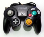 GAME CUBE - VIDEO GAME - Controle para console Game Cube de cor preta, peça original. Obs: não testado.
