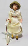 PRINCESAS DISNEY - PORCELANA - Belíssima figura em porcelana da personagem Jane da série Tarzan, peça original Disney. Medindo 17cm de altura.
