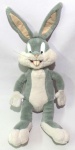 LOONEY TUNES - WARNER BROS - Bela figura eletrônica em pelúcia do personagem Pernalonga da série Looney Tunes, peça original Warner Bros. Medindo 45cm de altura. Obs: parte eletrônica não testada