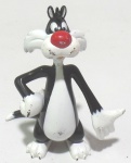 LOONEY TUNES - WARNER BROS - Figura em vinil do personagem Frajola da série Looney Tunes, peça original Warner Bros. Medindo 8cm de altura.