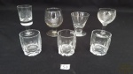 7 copos shot para aperitivo em cristal translucido.Medidas: menor 5cm altura 4cm diâmetro, maior 9cm altura e 5cm diâmetro.