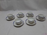 6 Xícaras De Café Em Porcelana Real Friso Azul Ouro. MEDINDO: XÍCARAS: 7CM DE DIÂMETRO X 4,5CM DE ALTURA; PIRES: 11CM DE DIÂMETRO