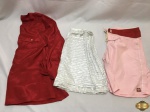 Lote de roupas feminina. Composto por 1 blusa social, 1 saia e 1 short  , peças em ótimo estado de conservação. Blusa social vermelha TAM:G , Saia TAM: M e short TAM: M.