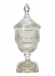 Compoteira em cristal europeu translúcido. Formato cônico com incisa lapidação de gomos e ladrilhos. Ornamentada por esmaltagem em harmonia das tonalidades azul e amarelo. Europa. Século XIX. 30 cm.