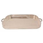 ST JAMES – Bandeja de cantos arredondados de metal espessurado a prata. Alças laterais em retorcidos. Apresenta marcas do `design` brasileiro. Brasil. Séc. XX. 53 x 30 cm.  
