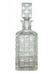 Garrafa para `whisky` em cristal translucido moldado e lapidado. Séc. XX. 28 cm.