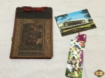 Lote composto de panfleto do Casino Estoril, marcador de páginas e álbum em artesanato chileno.